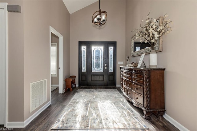 4933 W NC Highway 268, Wilkesboro, NC 28697 - foyer with wood finished floors, baseboards, high vaulted ceiling, and a chandelier
