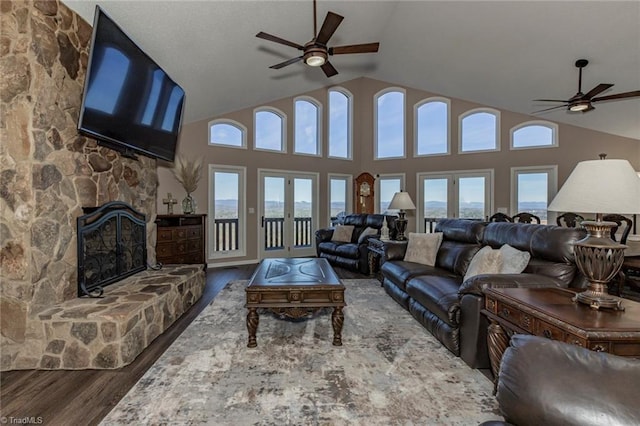 4933 W NC Highway 268, Wilkesboro, NC 28697 - living room featuring ceiling fan, wood finished floors, a fireplace, french doors, and high vaulted ceiling