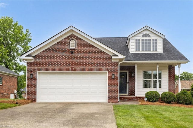 1329 Whitworth Ct, Kernersville, NC 27284 - view of front of house with driveway, brick siding, an attached garage, a front yard, and a shingled roof