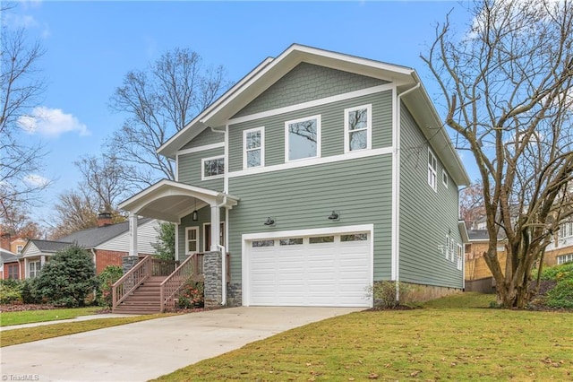 view of front of property featuring a front lawn, an attached garage, and driveway