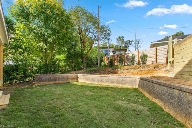 view of yard featuring fence