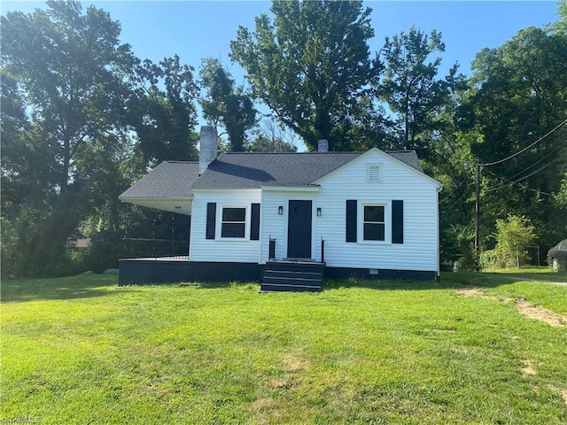 630 Liberty Rd, High Point, NC 27263 - view of front of house with a front lawn, a chimney, and crawl space