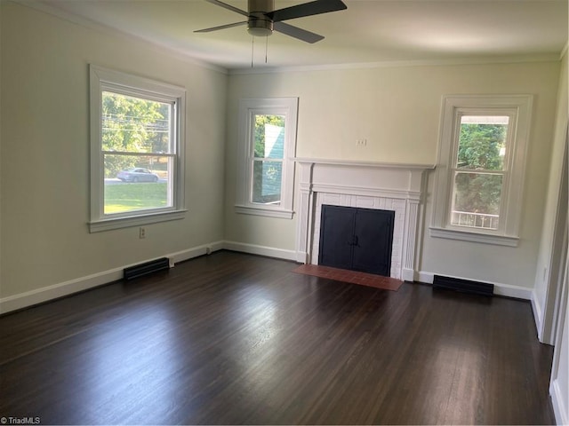 630 Liberty Rd, High Point, NC 27263 - unfurnished living room with a brick fireplace, dark wood-type flooring, a ceiling fan, and ornamental molding