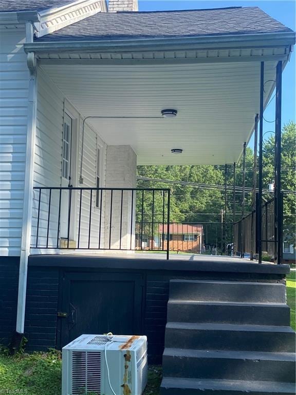 630 Liberty Rd, High Point, NC 27263 - view of side of property with a shingled roof and a central air condition unit