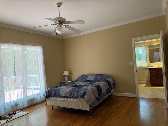1223 Gatehouse Rd, High Point, NC 27262 - bedroom featuring ornamental molding, light wood-style floors, baseboards, and a ceiling fan
