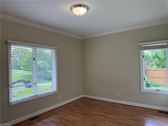 1223 Gatehouse Rd, High Point, NC 27262 - empty room featuring ornamental molding, wood finished floors, and baseboards