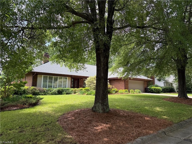 1223 Gatehouse Rd, High Point, NC 27262 - ranch-style home featuring an attached garage, a front lawn, brick siding, and a chimney