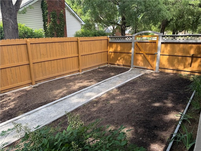 1223 Gatehouse Rd, High Point, NC 27262 - fenced backyard with a gate