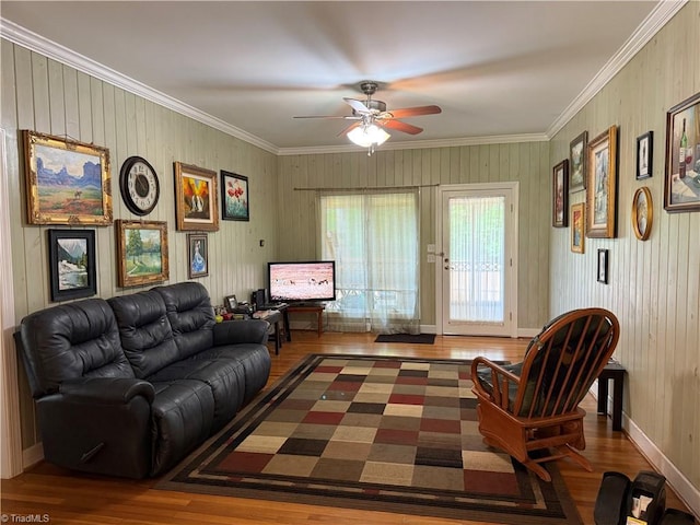 1223 Gatehouse Rd, High Point, NC 27262 - living area featuring crown molding, wood finished floors, ceiling fan, and baseboards