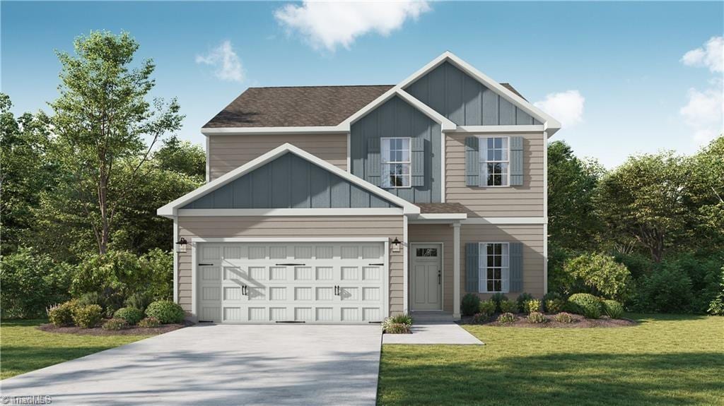 craftsman-style house featuring a garage and a front lawn