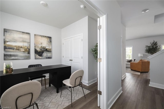 office space featuring dark wood-type flooring