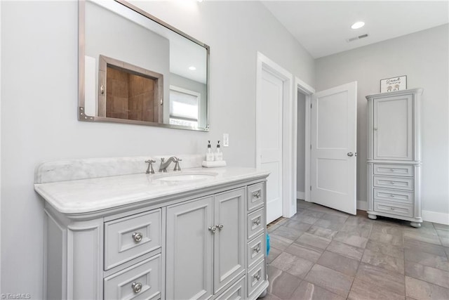 bathroom featuring vanity