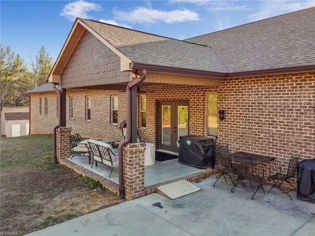 back of house with french doors and a patio