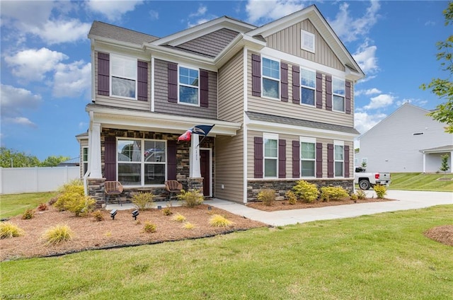 111 Park Place Cir, Winston-Salem, NC 27107 - craftsman-style home with stone siding, covered porch, and board and batten siding