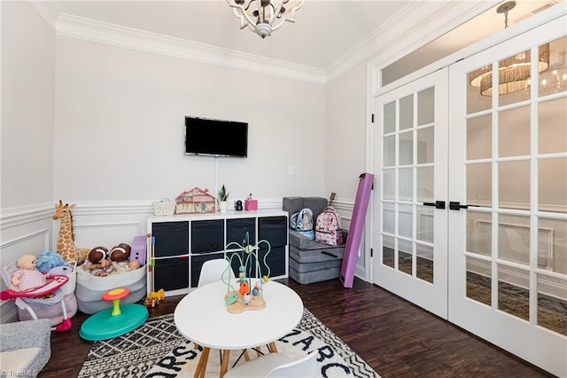 111 Park Place Cir, Winston-Salem, NC 27107 - rec room featuring french doors, a chandelier, ornamental molding, dark wood-style floors, and wainscoting