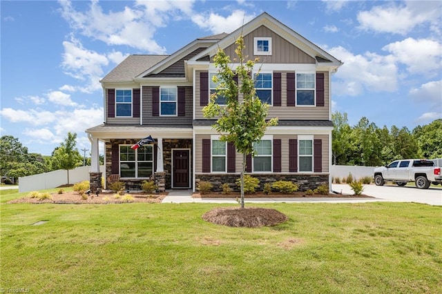 111 Park Place Cir, Winston-Salem, NC 27107 - craftsman-style home with stone siding, board and batten siding, and covered porch