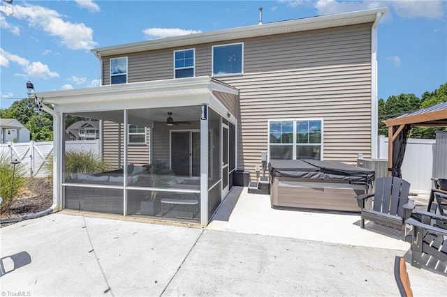 111 Park Place Cir, Winston-Salem, NC 27107 - rear view of house with a hot tub, a patio, a sunroom, and ceiling fan