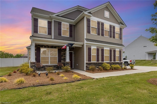 111 Park Place Cir, Winston-Salem, NC 27107 - craftsman-style house featuring stone siding, a porch, and board and batten siding