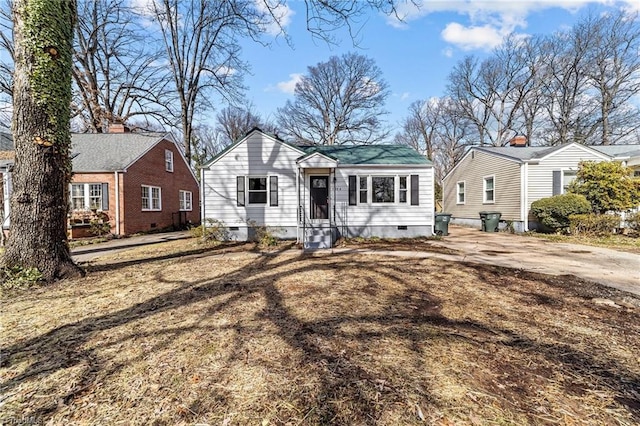 view of front of property with crawl space and entry steps