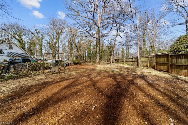 view of yard featuring fence