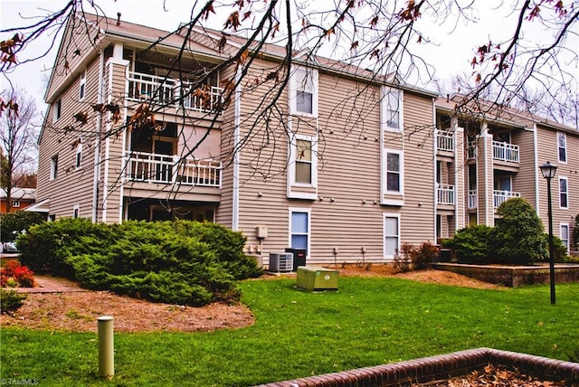 view of building exterior featuring central AC unit