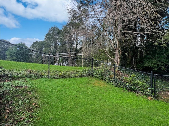 view of yard featuring fence