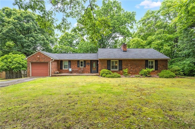 365 Ransom Rd, Winston-Salem, NC 27106 - ranch-style home with a garage, brick siding, asphalt driveway, and a chimney