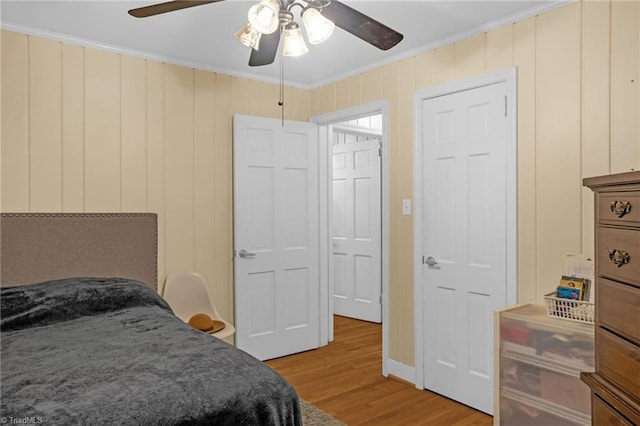 365 Ransom Rd, Winston-Salem, NC 27106 - bedroom with light wood finished floors, ornamental molding, and a ceiling fan