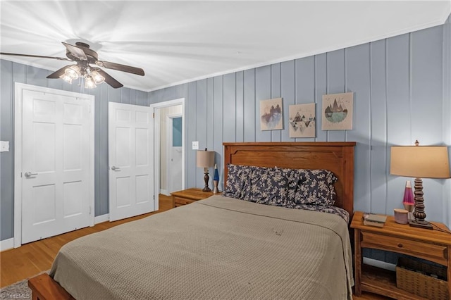365 Ransom Rd, Winston-Salem, NC 27106 - bedroom with ornamental molding, wood finished floors, and ceiling fan