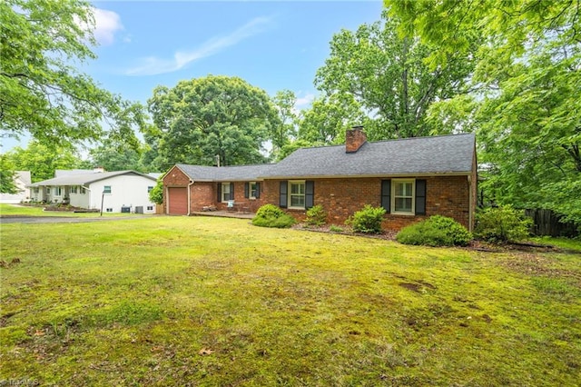 365 Ransom Rd, Winston-Salem, NC 27106 - ranch-style house featuring an attached garage, a chimney, and brick siding