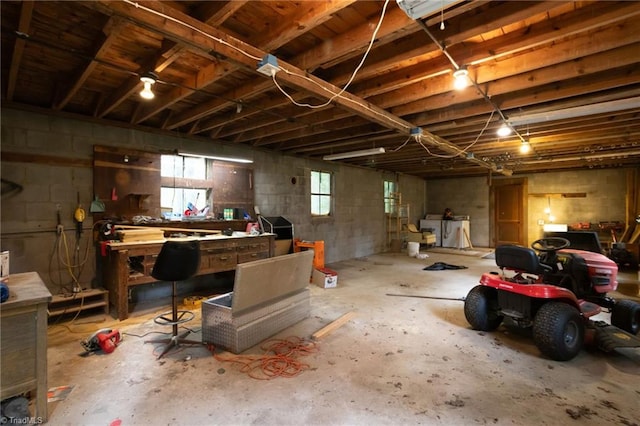 365 Ransom Rd, Winston-Salem, NC 27106 - basement featuring a workshop area and concrete block wall