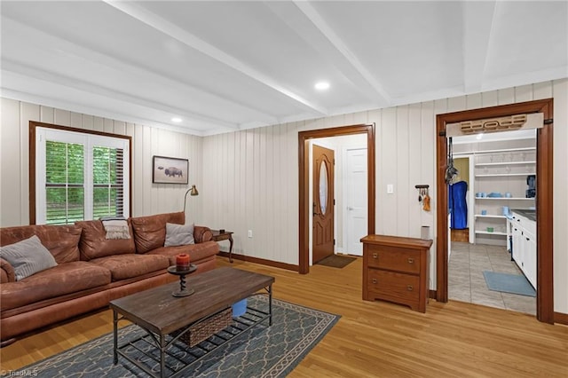 365 Ransom Rd, Winston-Salem, NC 27106 - living room featuring beamed ceiling, light wood-style floors, and baseboards