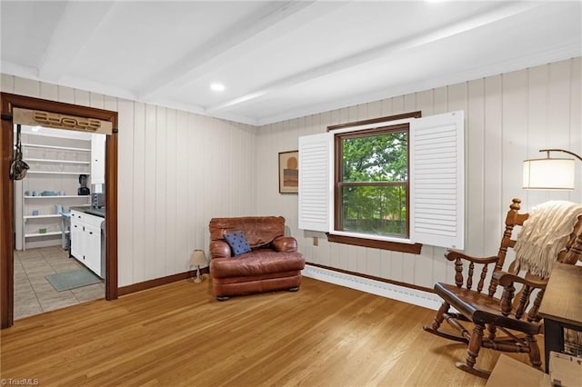 365 Ransom Rd, Winston-Salem, NC 27106 - living area featuring beamed ceiling, light wood-style flooring, baseboards, and a baseboard heating unit