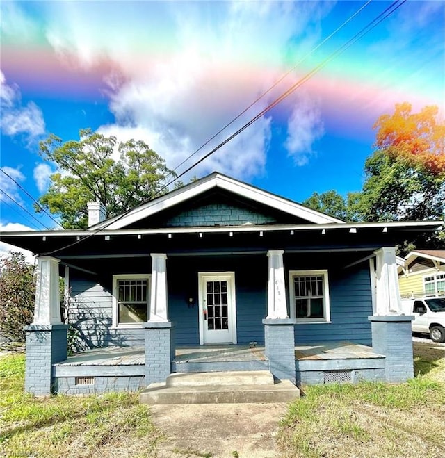 bungalow-style home with covered porch