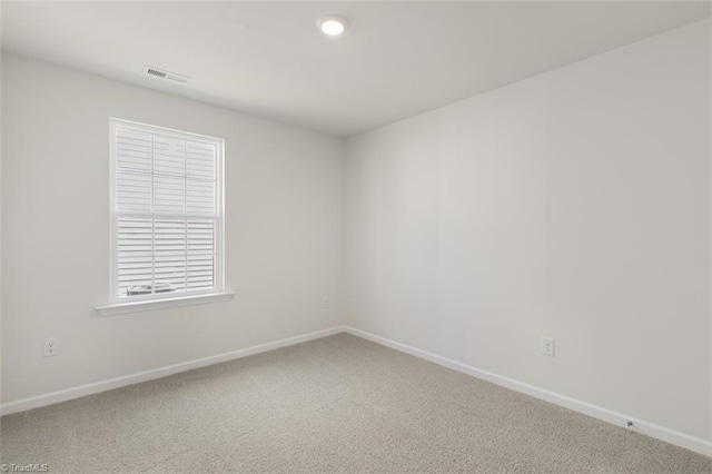152 E Farm Loop, Stokesdale, NC 27537 - carpeted empty room with visible vents and baseboards