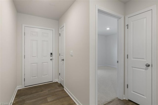 152 E Farm Loop, Stokesdale, NC 27537 - hallway featuring baseboards and dark wood finished floors