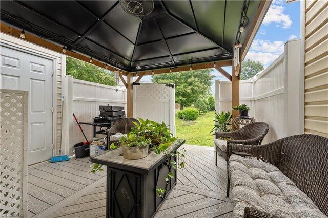 wooden deck with a gazebo