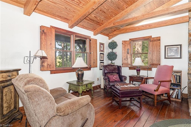 living area with wood ceiling, lofted ceiling with beams, and hardwood / wood-style floors