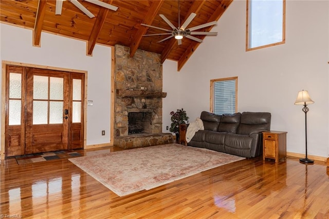 living area featuring wooden ceiling, light wood-style floors, and a ceiling fan