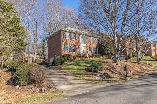 colonial-style house featuring a garage