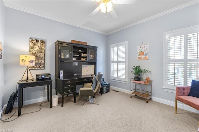 carpeted office with a wealth of natural light, crown molding, and ceiling fan