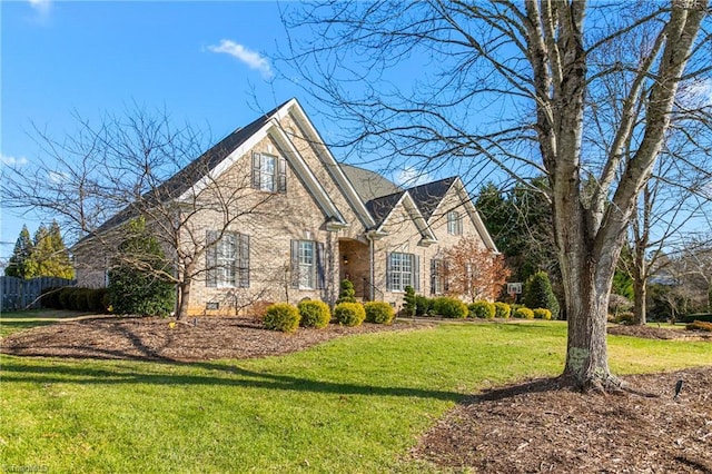 front of property featuring a front lawn