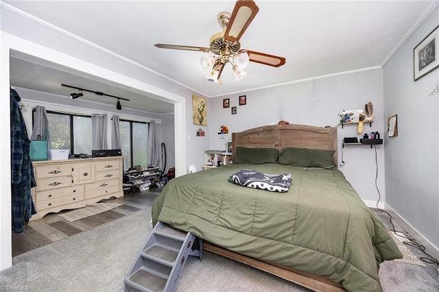 7387 NC Highway 62, Trinity, NC 27370 - bedroom with ornamental molding, access to exterior, and ceiling fan
