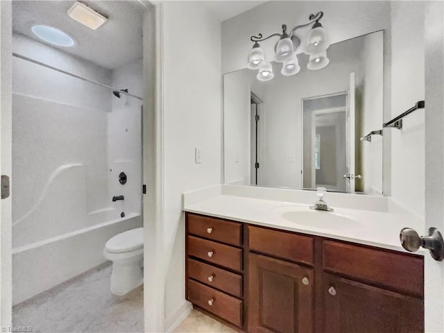 bathroom with  shower combination, vanity, and toilet