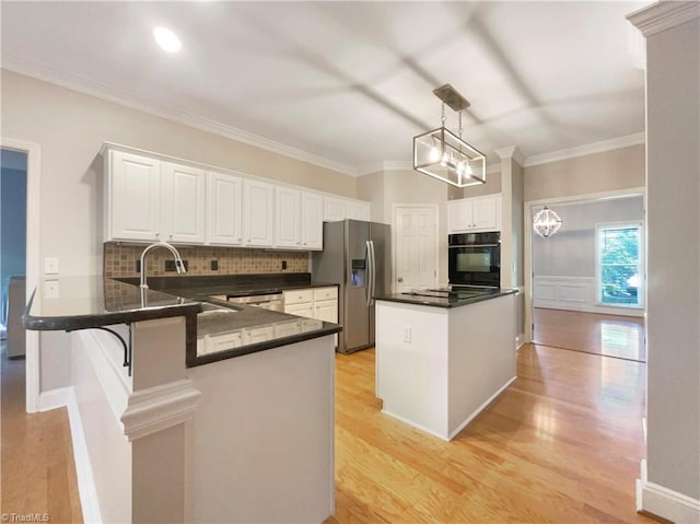 kitchen with oven, ornamental molding, stainless steel refrigerator with ice dispenser, backsplash, and light wood finished floors