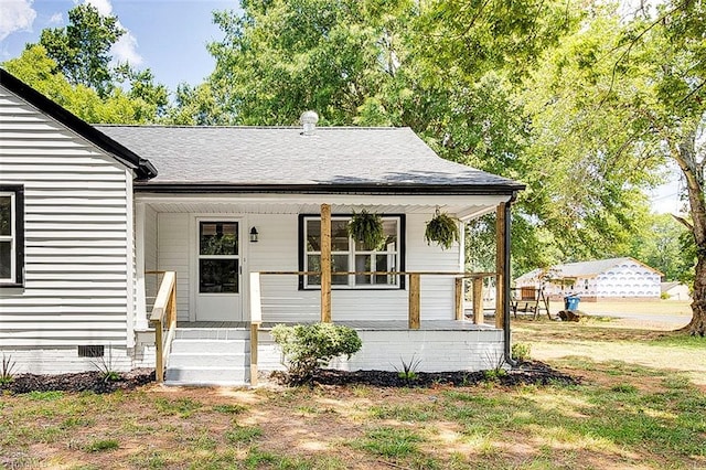 view of front of home featuring covered porch