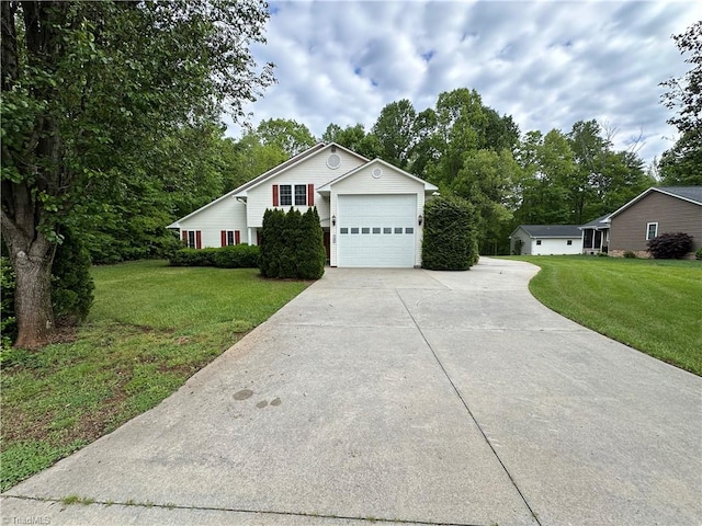 ranch-style house with a garage and a front yard