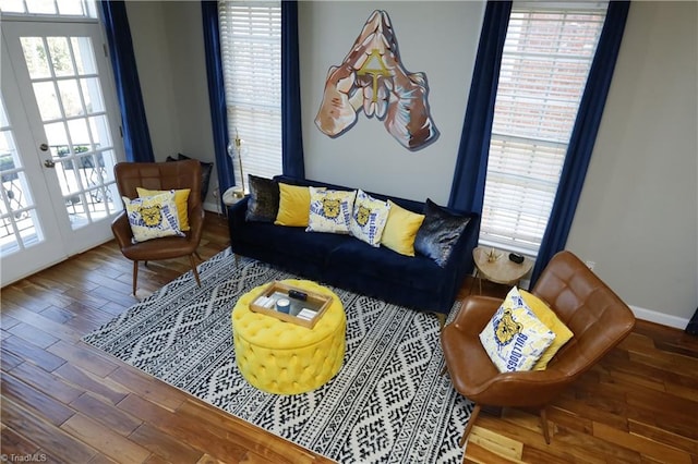 living room featuring french doors and wood-type flooring