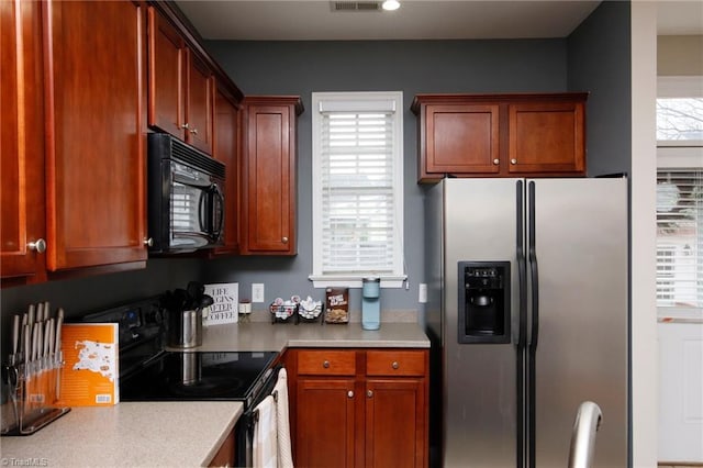 kitchen with black appliances