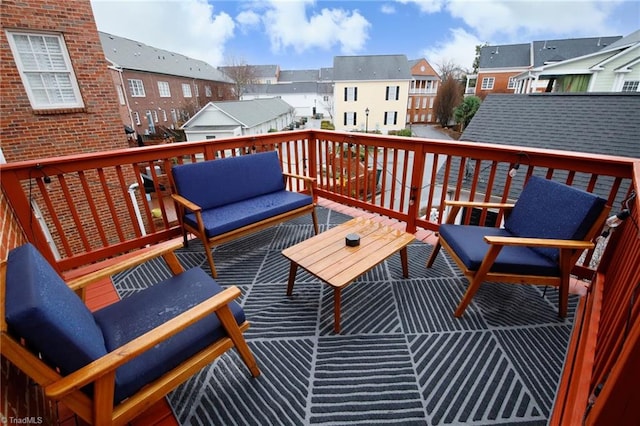 wooden deck featuring an outdoor living space